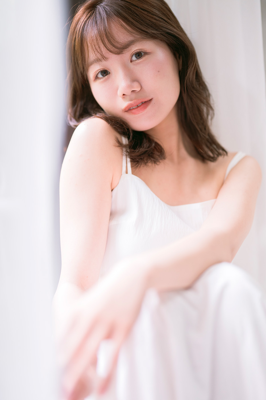 50mmは人と背景が調和しながら、人の存在感を写し出せる
